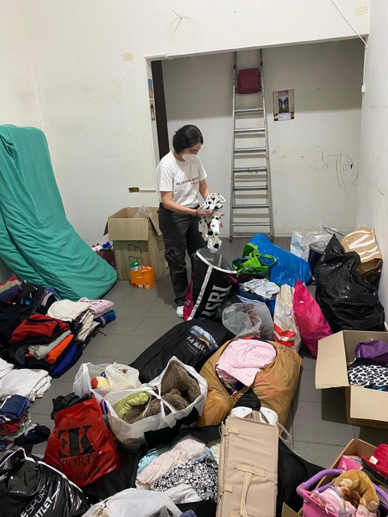 WDBF volunteer sorting donations in Lebanon